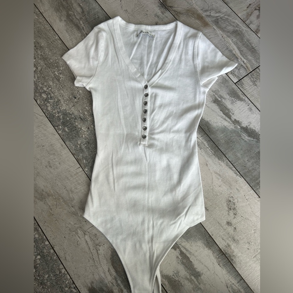 Abercrombie & Fitch size small Henley vneck bodysuit. Never worn.